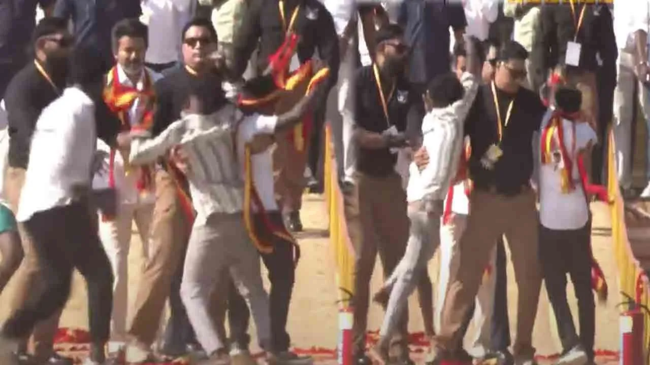  The youths running towards Vijay - the bouncers who threw them for Alex Photograph: (tvk) 