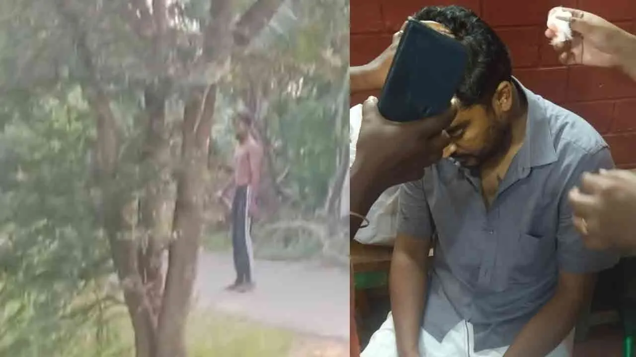  A man Disturbing not giving way to vehicles and blocks car, hit them and snatches chain 