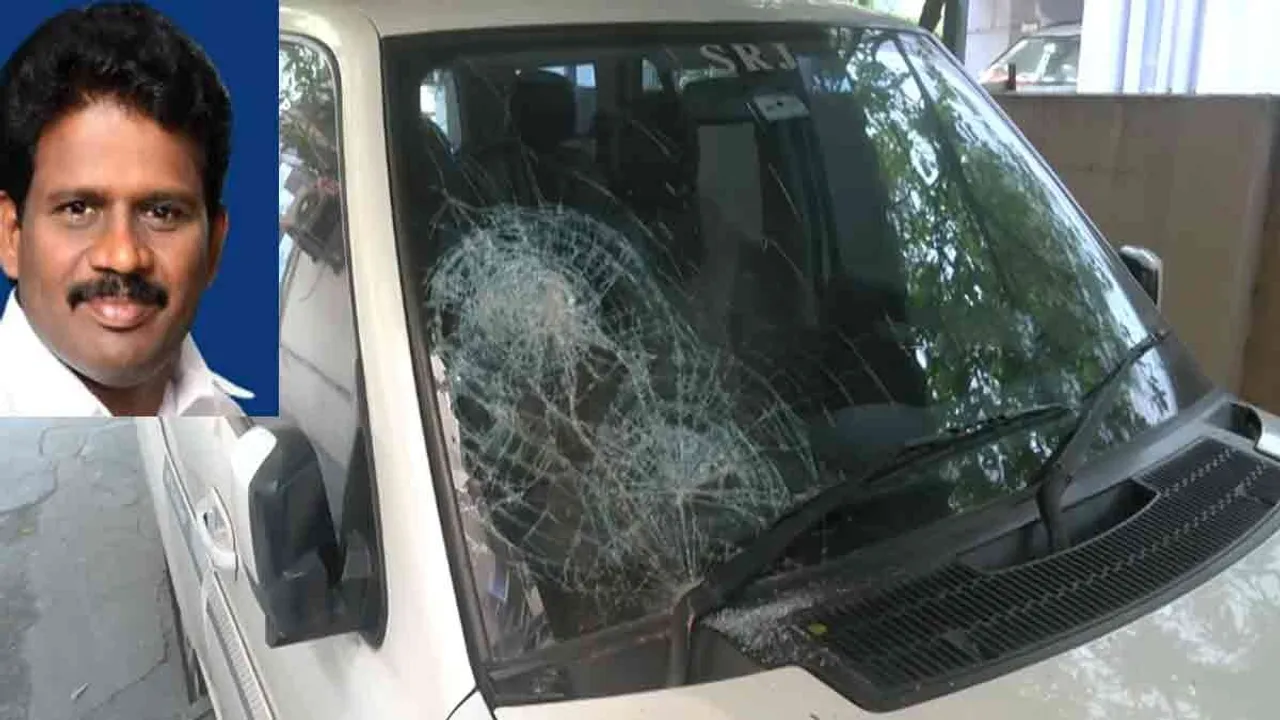  Former DMK MP's car vandalized - Police investigating Photograph: (police) 