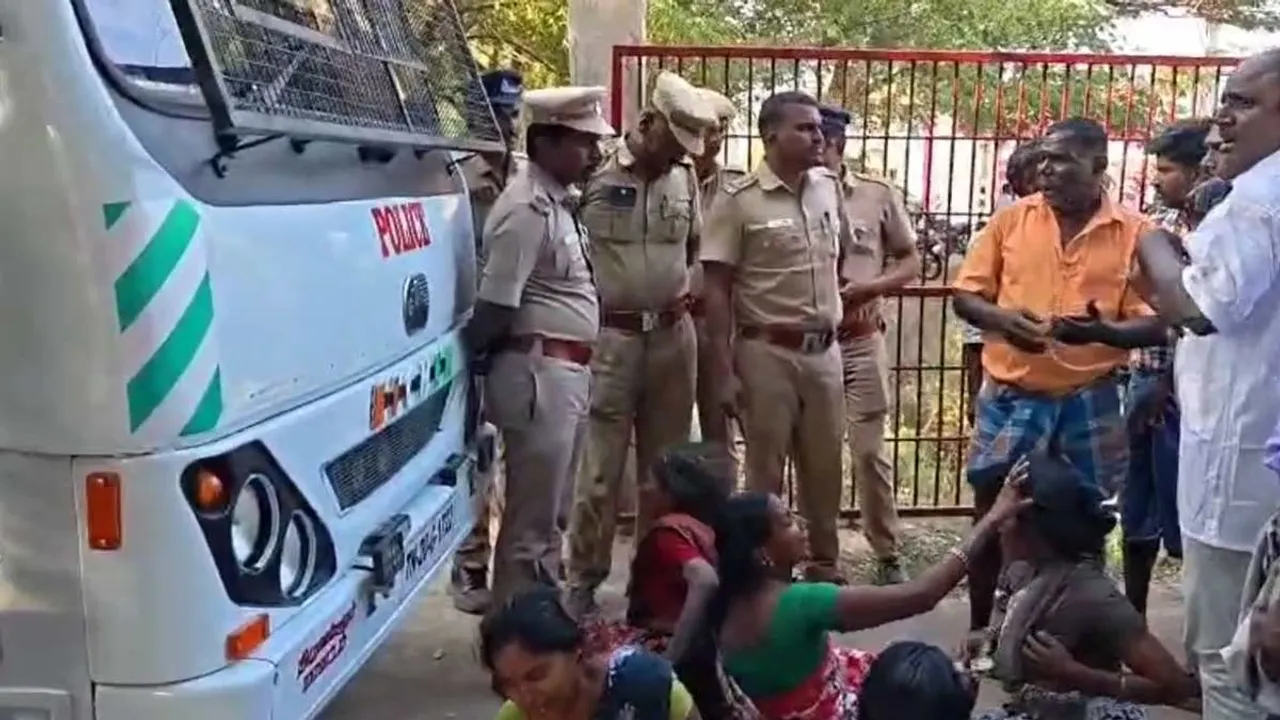  ''Our people should not be arrested...'' - Police block vehicle and lie down and struggle Photograph: (police) 