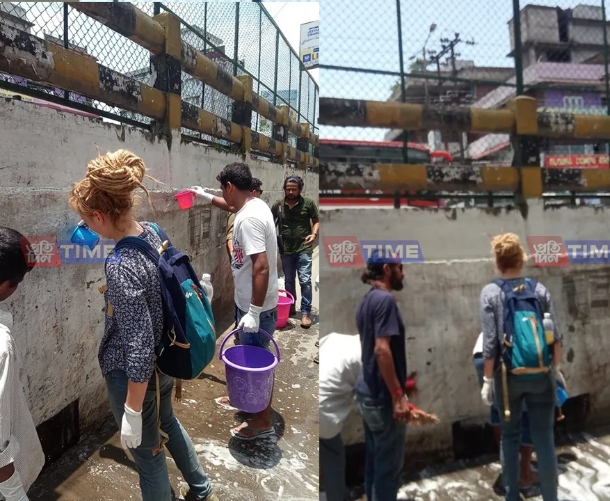 Lithuania girl cleans Guwahati walls