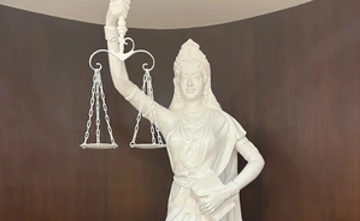  Lady Justice in SC library now holds a Constitution with open eyes