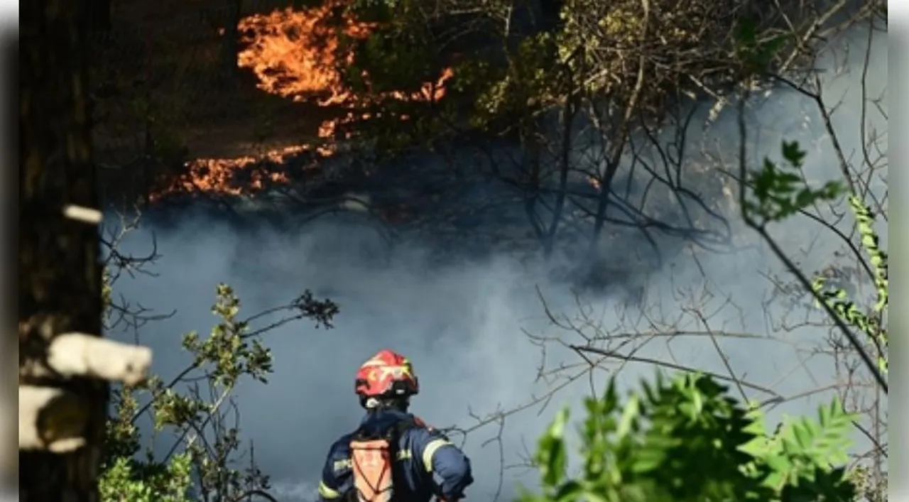  Wildfires sweep across Greece, forcing mass evacuations