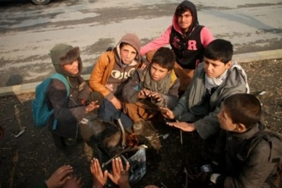  Children huddled together in Kabul 