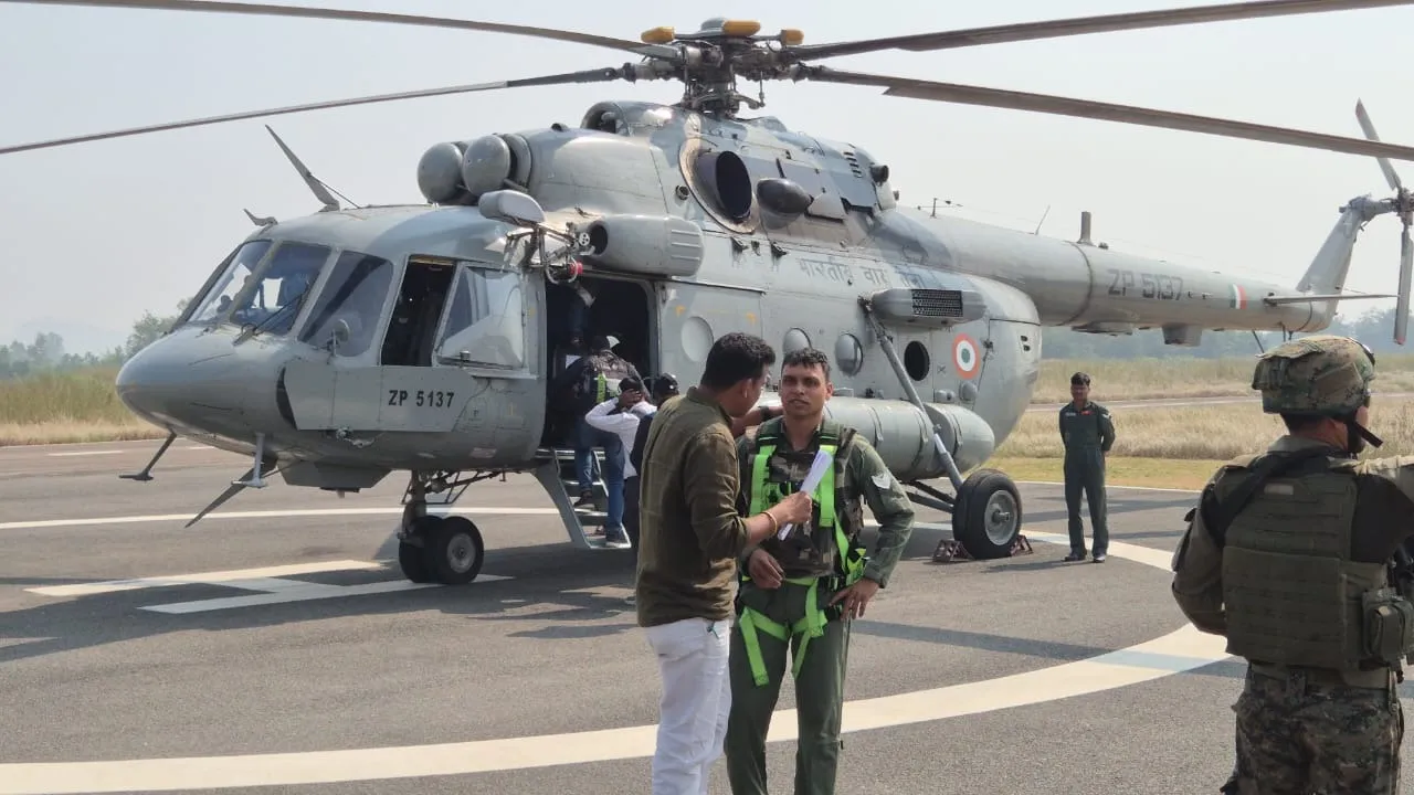  An Indian Airforce chopper carrying polling officials and EVMs to eight booths located in Maoist-affected areas of Nuapada.  