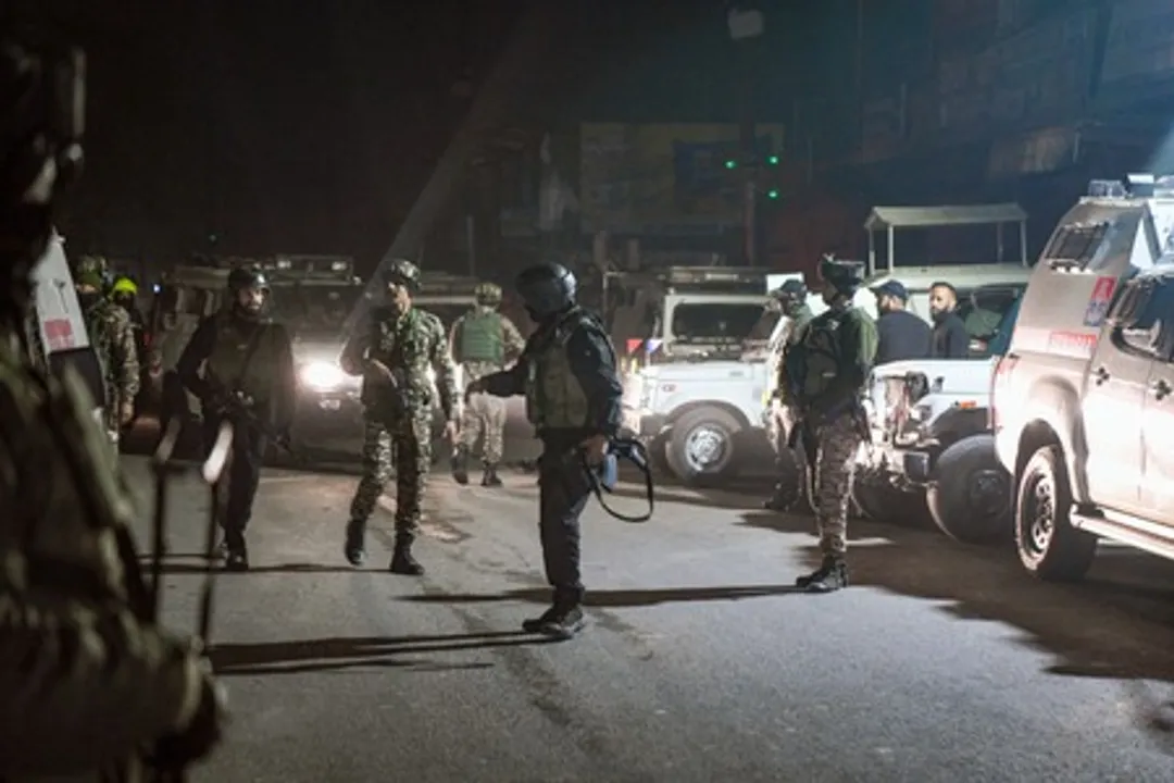  Security personnel at the Nowgam blast site 