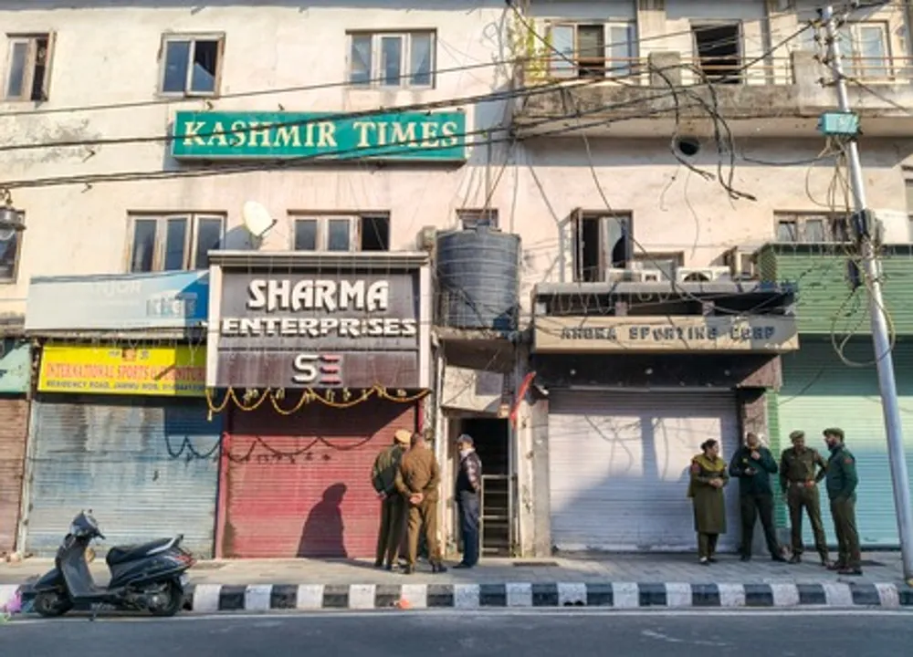  Security personnel outside the Kashmir TImes office in Jammu 