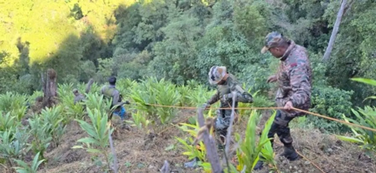  Security personnel during the rescue operation at the accident site.  