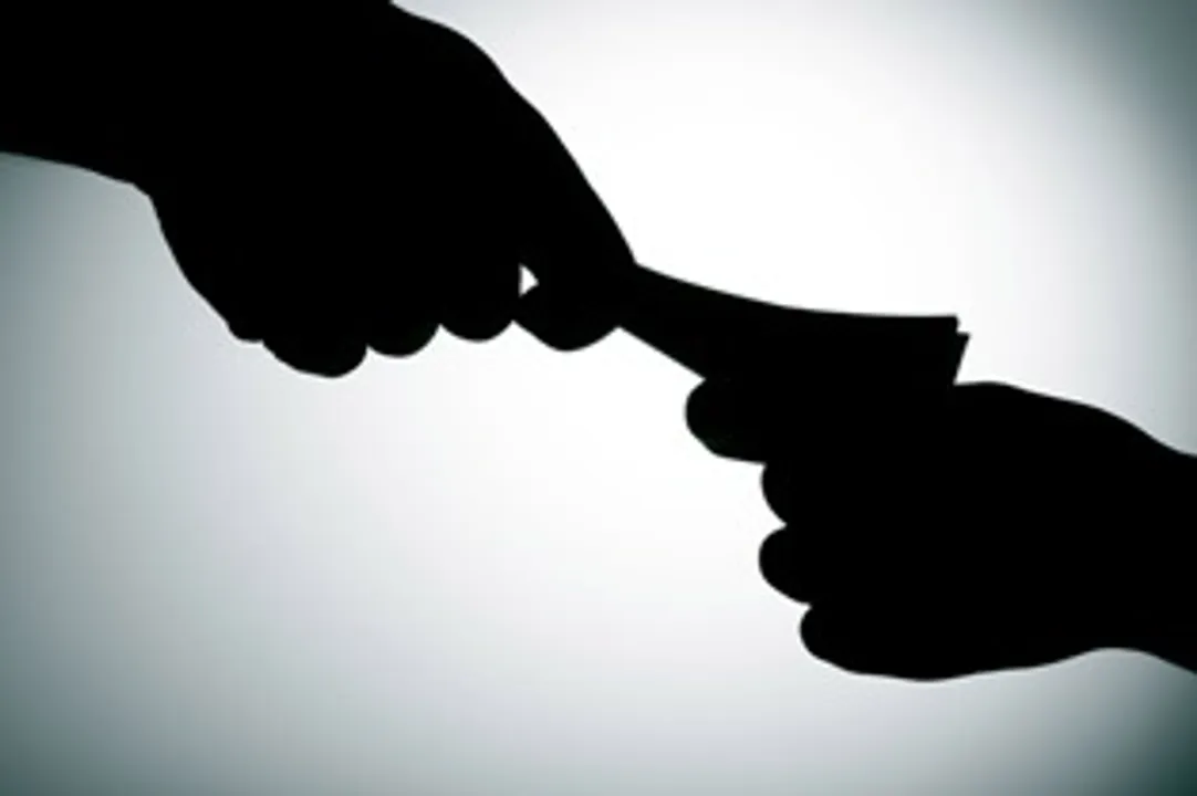  Odisha Police officer caught taking bribe