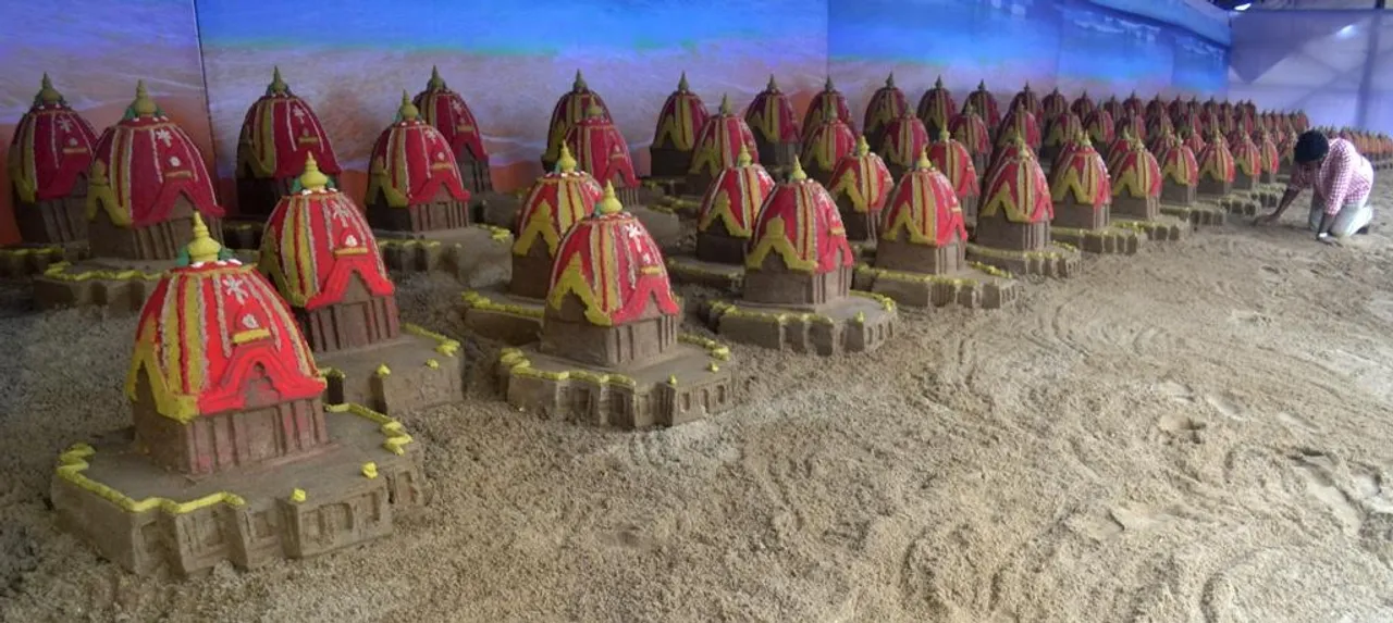  Sudarsan, students set new record by creating 100 sand chariots
