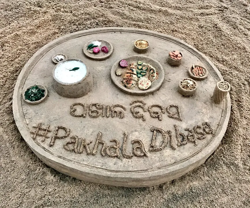 Sudarsan creates sand art on International Pakhala Dibasa in Odisha