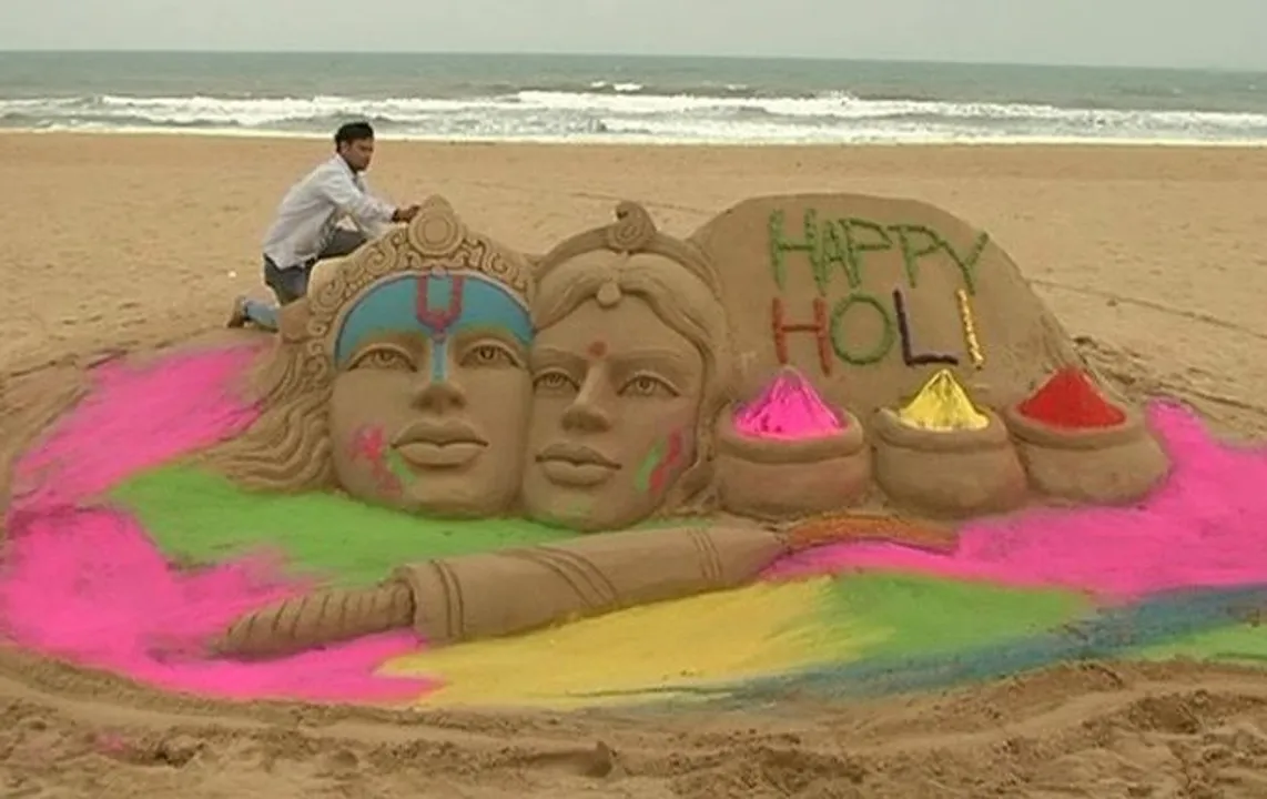  Sand sculpture on Radha-Krishna by Odisha artist for Holi