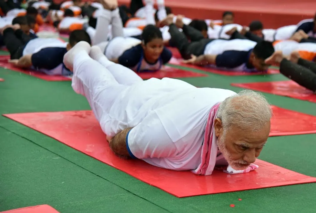  International Yoga Day: PM Narendra Modi does yogic exercises amid rain