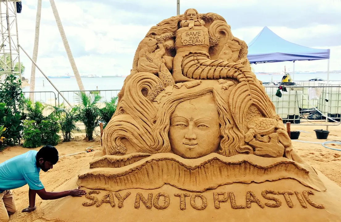  Odisha’s Sudarshan Pattnaik carves sand art for ‘clean ocean’ in Singapore