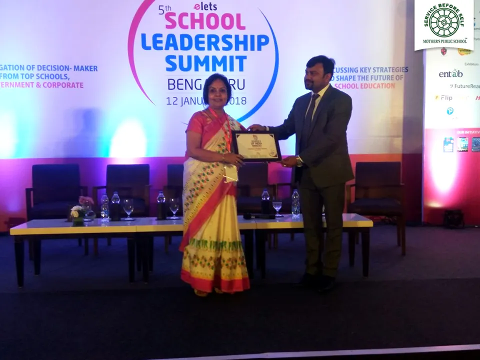 Founder-Principal of Mother's Public School, Poly Patnaik, receiving the award of Best School in east zone in the elets 5th School Leadership Summit.
Picture courtesy: Facebook/ Mother's Public School 
