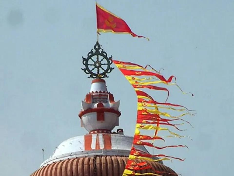  After FANI, regular-size holy flag affixed atop Sri Mandir