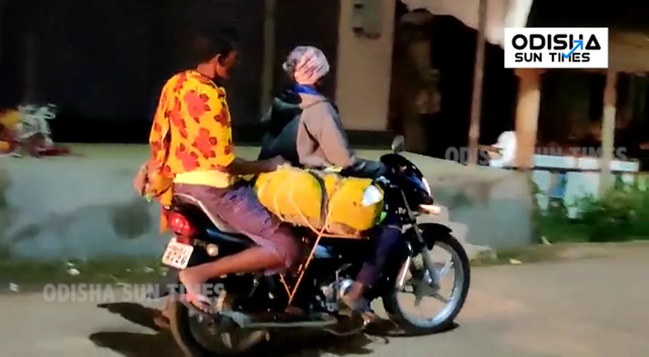  Denied hearse, Odisha man carries father's body on motorcycle [Watch]