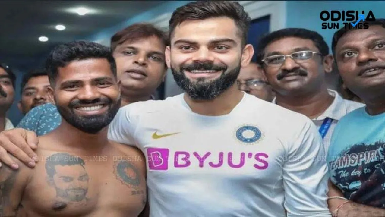  Kohli meets fan from Odisha who has 14 tattoos of his favourite cricketer