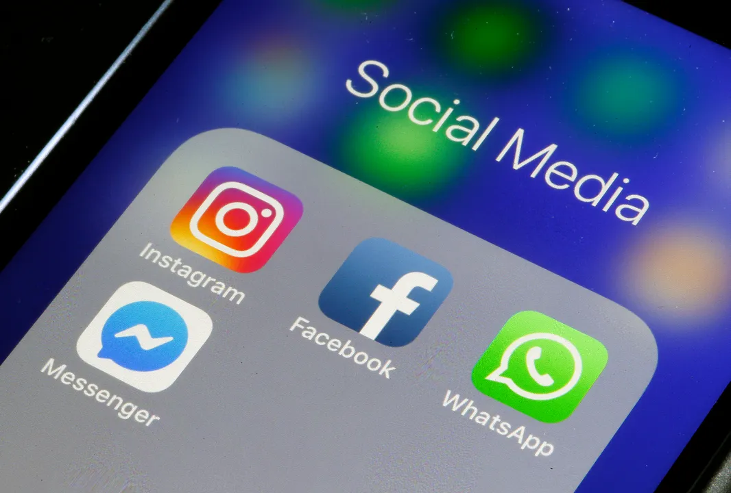  PARIS, FRANCE - MARCH 15: In this photo illustration, the logos of the messaging applications, WhatsApp, Instagram, Messenger and Facebook are displayed on the screen of an Apple iPhone on March 15, 2019 in Paris, France. Social media Facebook, Instagram, Messenger and WhatsApp have been affected by a global outage for nearly 24 hours on March 14, 2019 cutting virtual worlds to nearly 2.3 billion potential users. Facebook has explained the causes of malfunctions that have disrupted its networks in recent days. This failure is due to the "server configuration change" that has caused cascading problems Facebook is excused for the inconvenience caused to users and companies that are dependent on Facebook, Instagram or WhatsApp to run their business.(Photo by Chesnot/Getty Images) 
