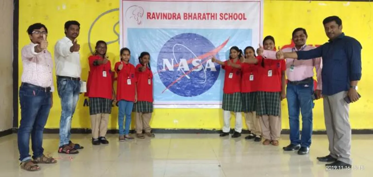 Swastika Senapati (3rd from left) along with classmates and teachers at her school 