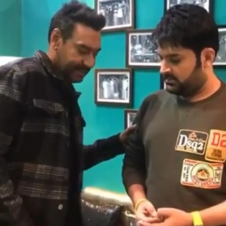 [Watch] Ajay Devgn 'bribes' Kapil Sharma