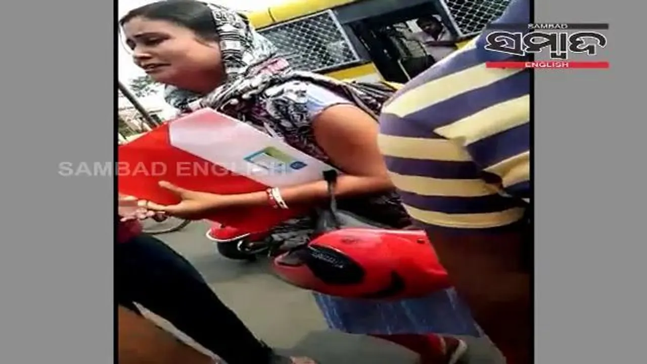  [WATCH] Crying woman goes on to touch cop's feet in Odisha capital. Here's why