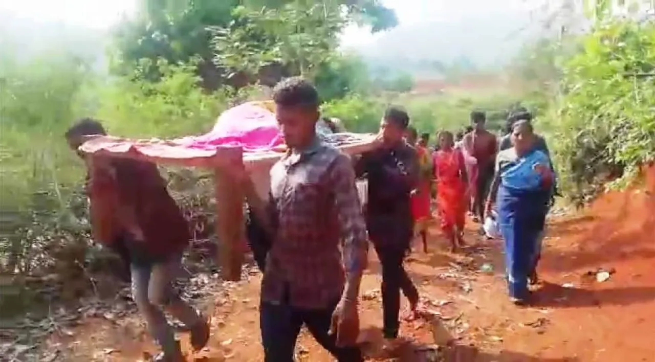  Expectant mother carried on cot to reach ambulance in Odisha village