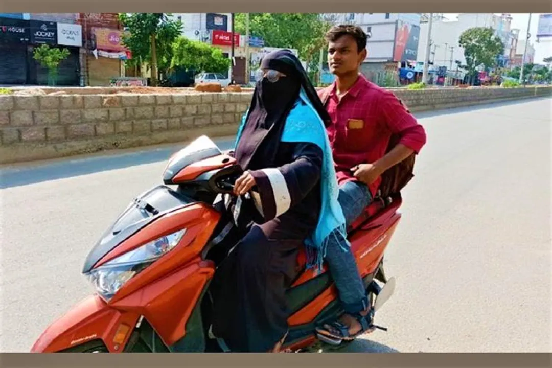  Woman drives 1400 km on scooter to bring her stranded son home