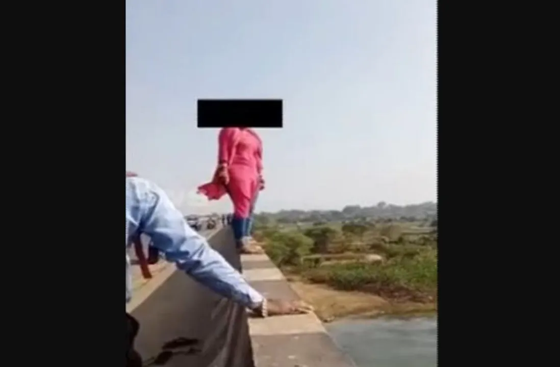  Watch: Youth saves woman from jumping into river in Odisha