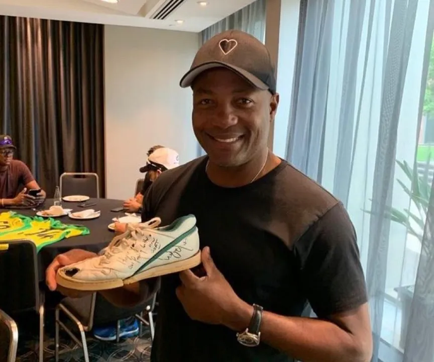  When cricket legend Brian Lara brought his Wasim Akram-punctured 1992 World Cup shoe to charity; read full story