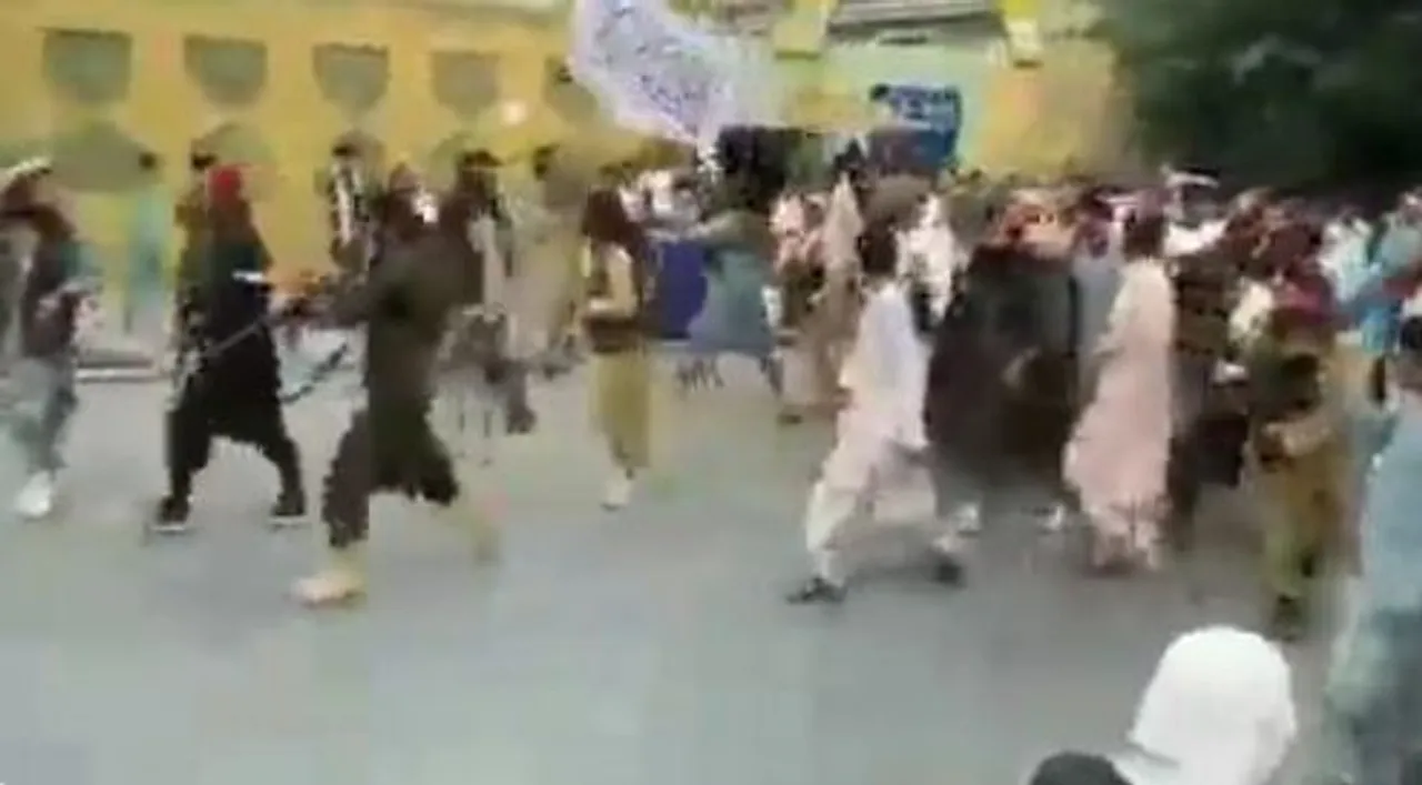  Taliban militants with flags seen on Kabul streets