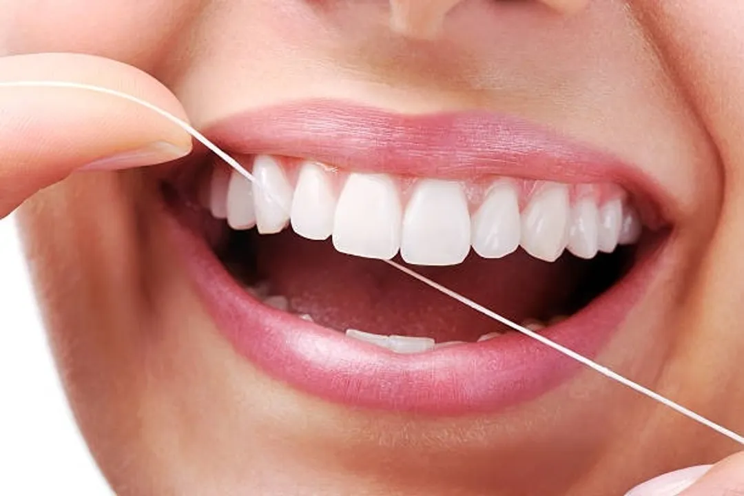  Flossing teeth .(photo:Pixabay.com) 