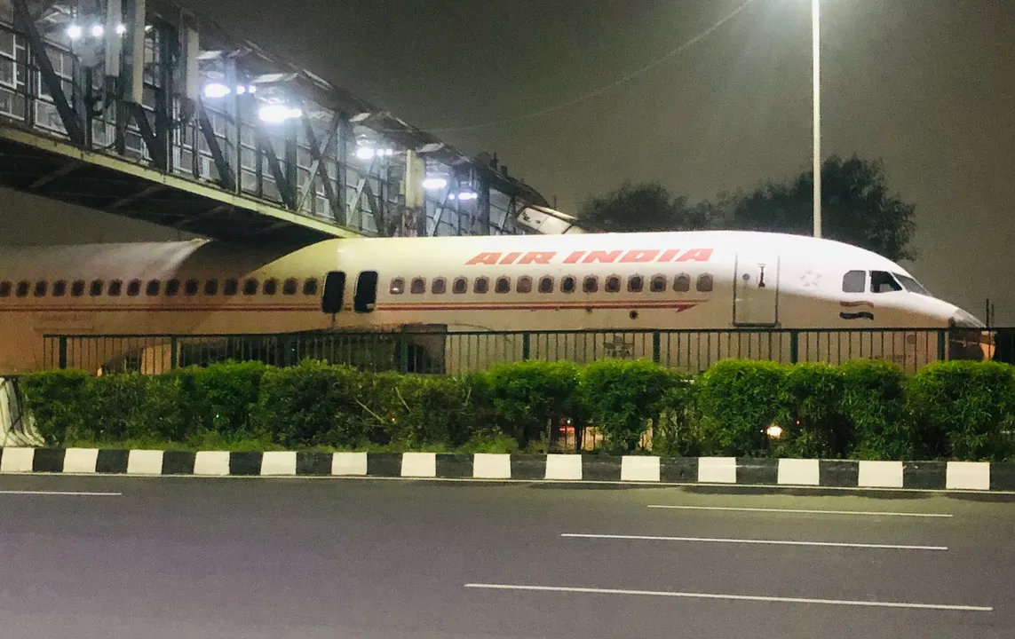 Air India plane stuck under foot overbridge on Delhi-Gurugram highway [Watch]