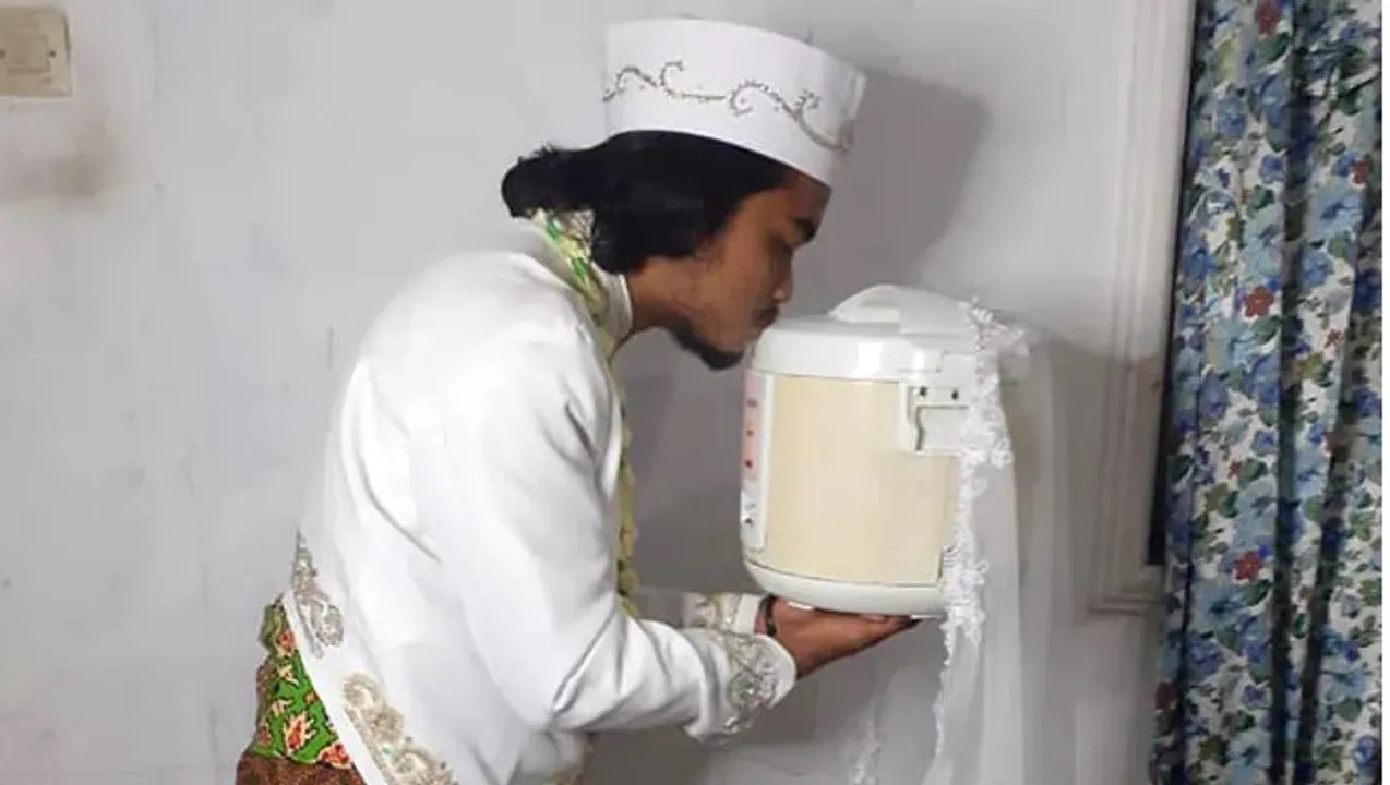  Man marries rice cooker, divorces it 4 days after!