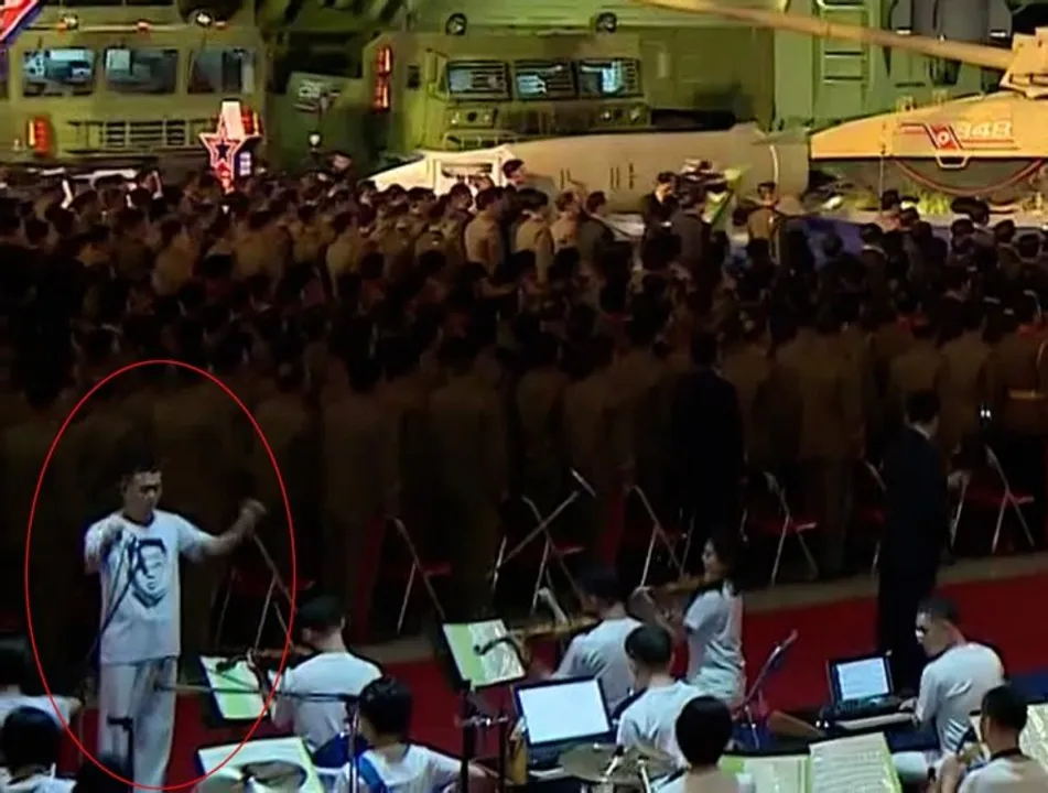  For first time ever, t-shirt with portrait of Kim Jong-un appears at North Korea's public event