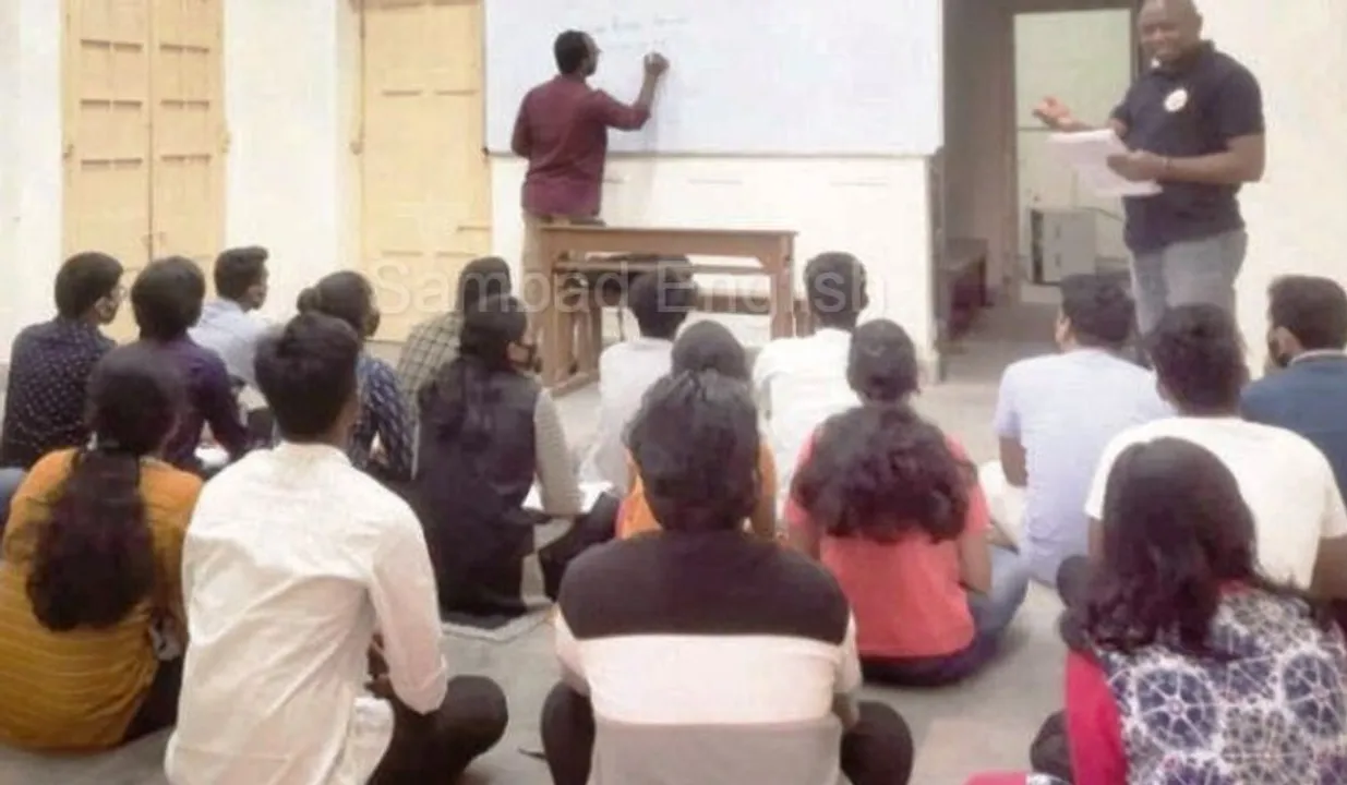  In this Ravenshaw University PG dept, students sit on floor to attend classes