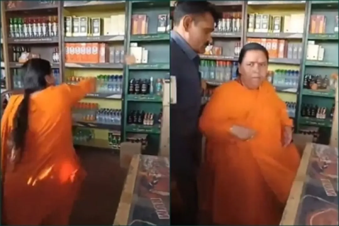  Watch Video: Uma Bharti vandalises liquor shop in Bhopal