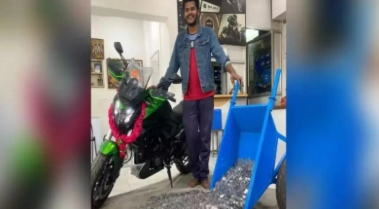  Tamil Nadu man buys dream bike using one rupee coins collected over years