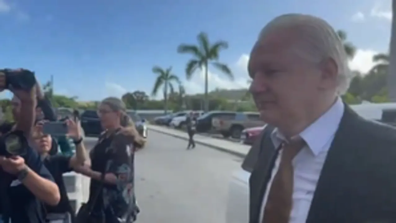  WikiLeaks founder Assange walks out of court as a 'free man'