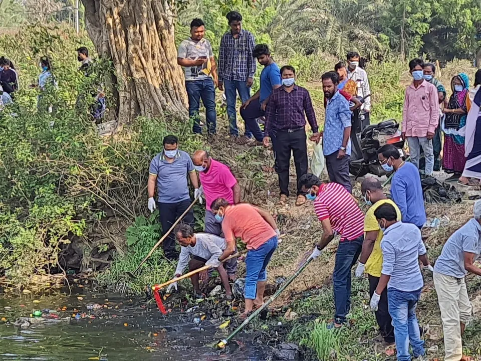  In Pics: Ganjam Collector Vijay Amruta Kulange cleans pond with locals