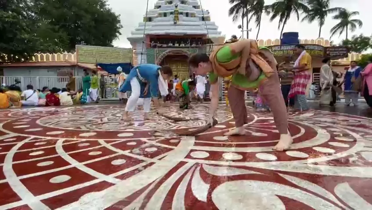  [Watch] Foreign devotees clean outside Puri Gundicha Temple ahead of Ratha Jatra