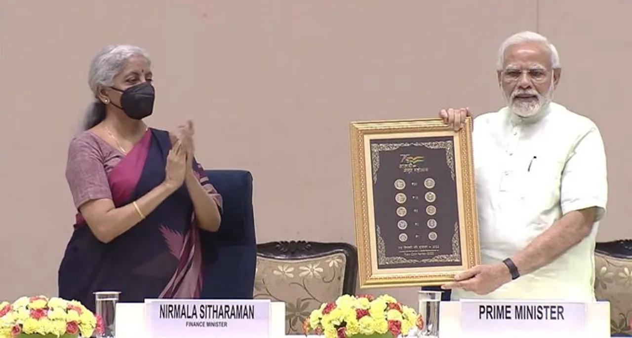  PM Modi releases special series of coins with AKAM logo
