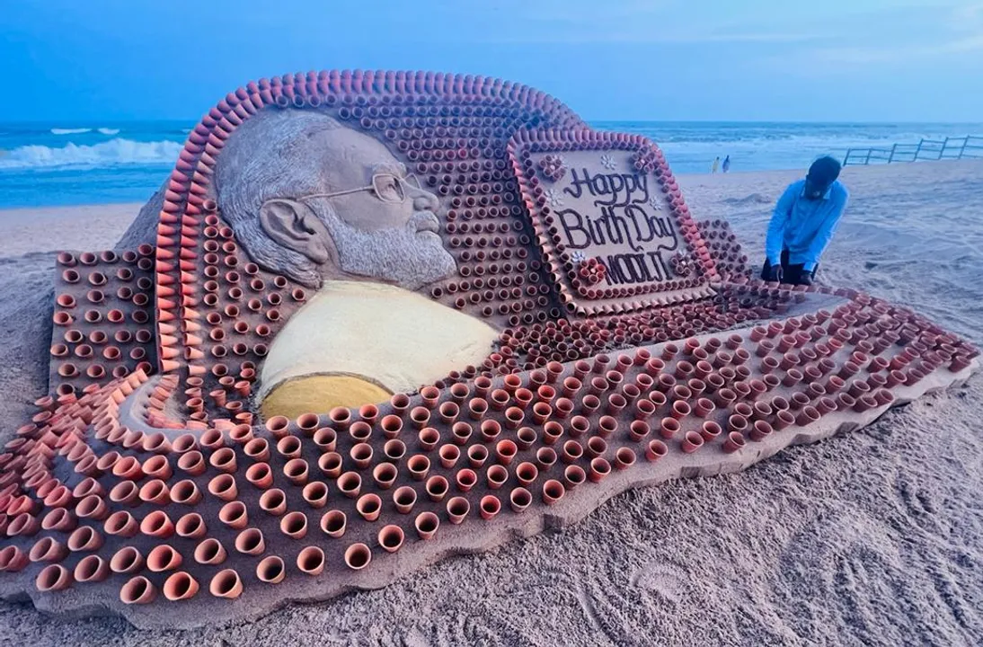  Unique birthday wish: Sudarsan Pattnaik creates PM Modi’s sand sculpture with 1,213 mud tea cups
