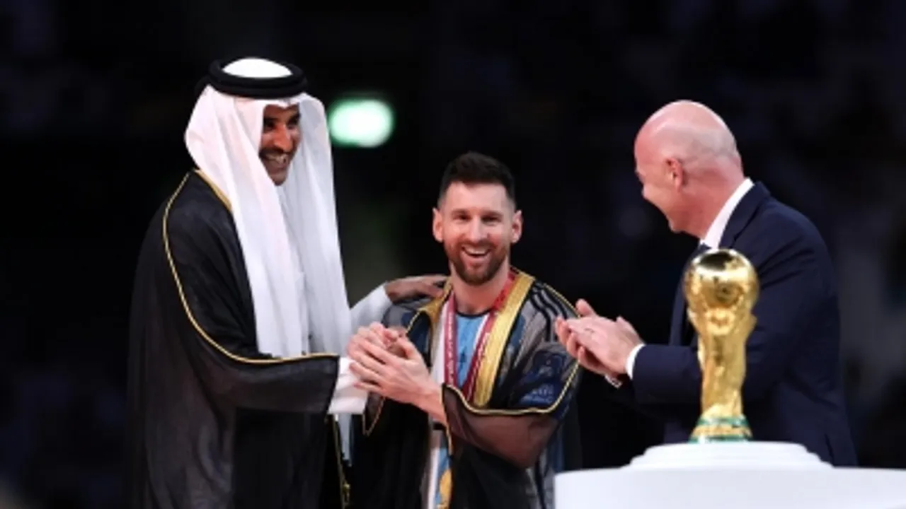  Emir of Qatar placing a robe on Messi at presentation ceremony creates a storm of anger
