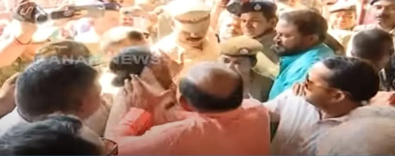  Watch Video: BJP MLA Jayanarayan Mishra manhandles woman IIC in Sambalpur