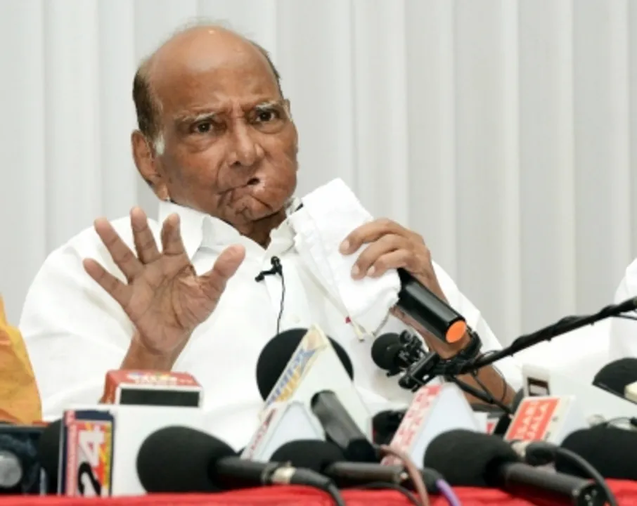  Sharad Pawar bows to party's wishes, to continue as NCP President