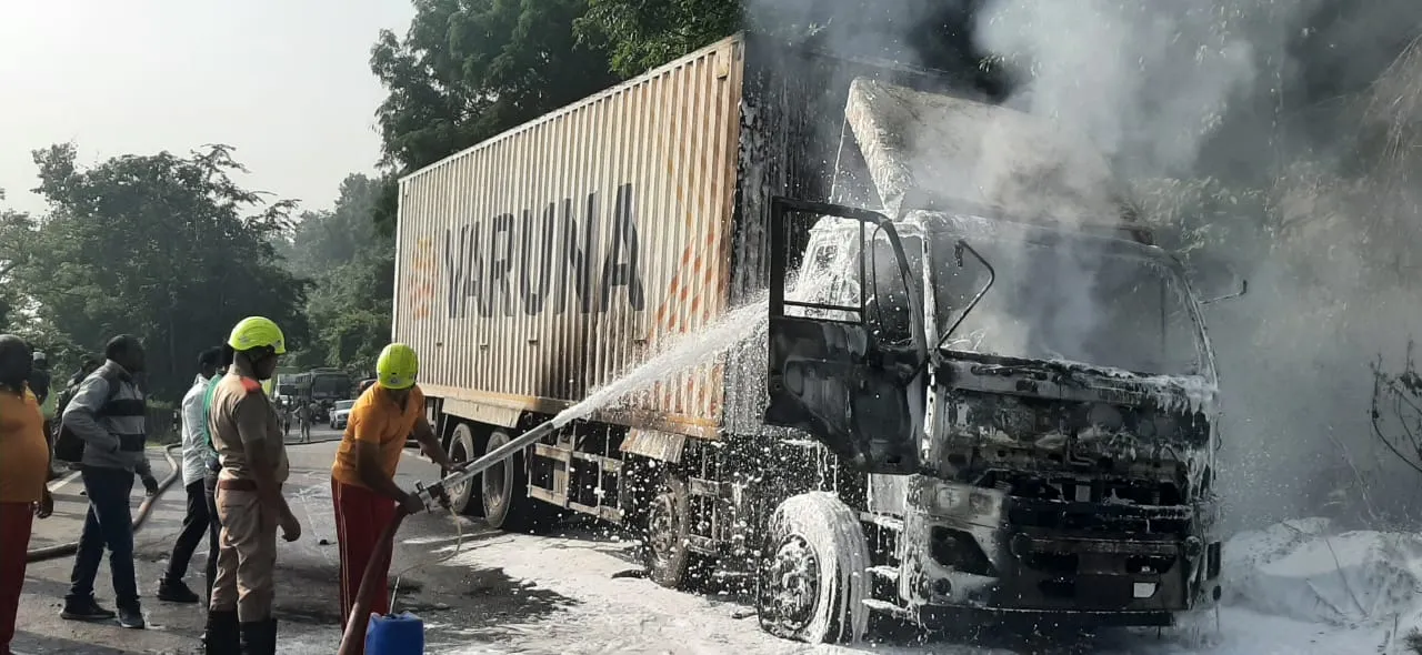  Moving container truck catches fire on NH in Odisha's Mayurbhanj