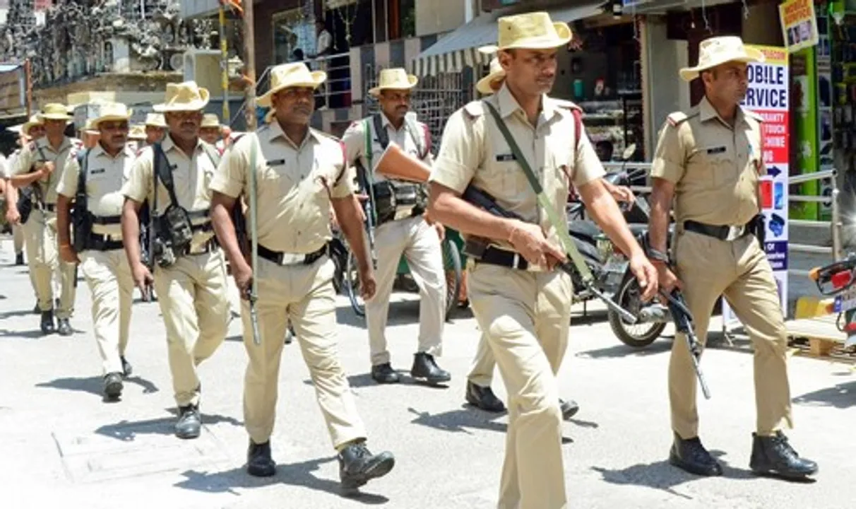  Bengaluru: Railway Protection Special Force take out a route march ahead of Karnataka state assembly elections at Ulsoor gate police station limits in Bengaluru on Monday, April 10, 2023. (Photo: Dhananjay Yadav/IANS) 