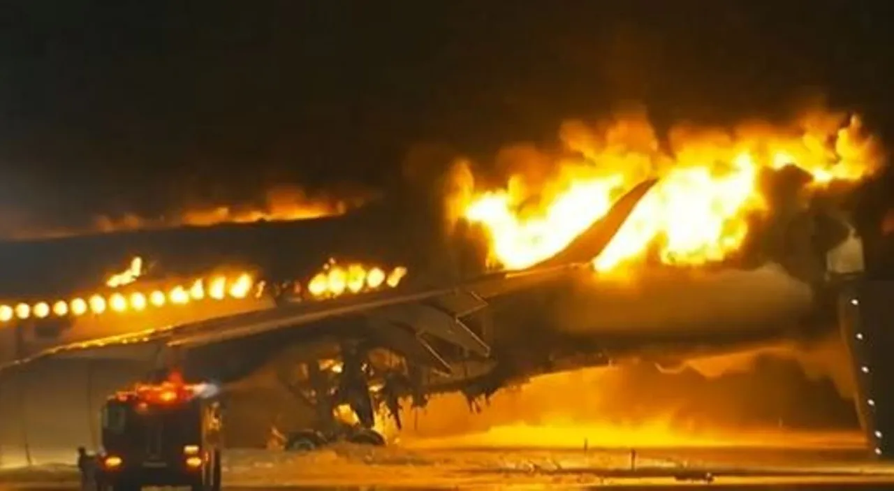  Japan Airlines plane catches fire at Tokyo airport; all 379 passengers, crew escape