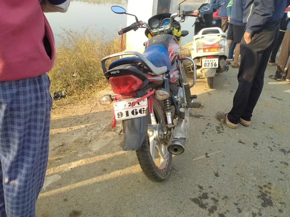  2 young men die as bike fell into water Photograph: (sambad.in) 
